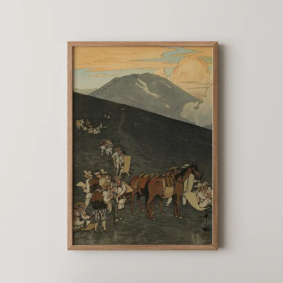 Framed painting of a landscape featuring people carrying goods on a mountain path with a horse and colorful clouds in the sky.