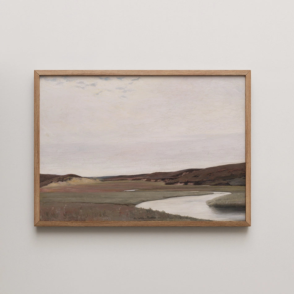 Framed painting depicting a serene landscape with a winding river, rolling hills, and a cloudy sky.