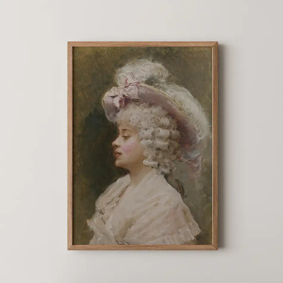 Portrait of a woman wearing a large hat with curls, framed in wood against a neutral background.