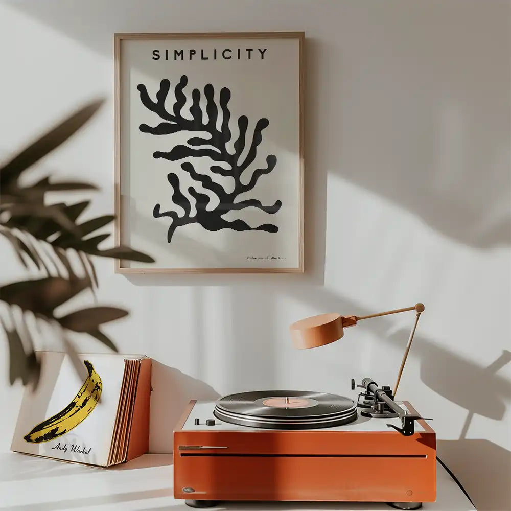 Modern poster reprint titled "Simplicity" featuring abstract black coral design, perfect for stylish home decor.