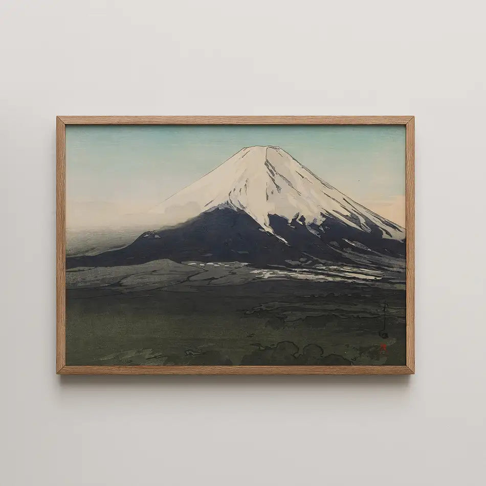 Framed painting of Mount Fuji, showcasing a snow-capped peak against a serene sky and landscape.
