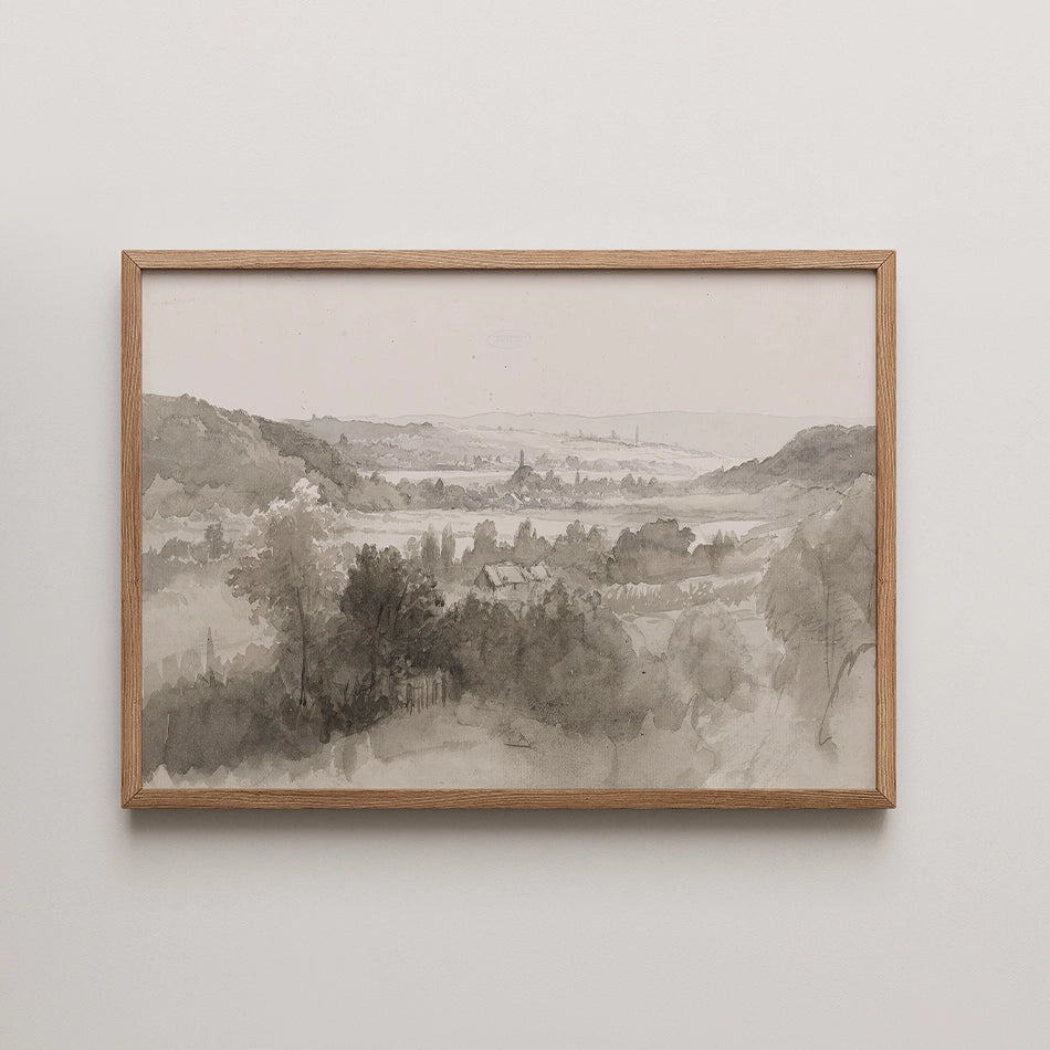 Framed watercolor landscape painting featuring soft gray tones of hills and trees.