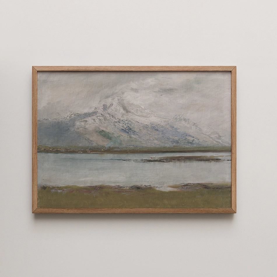 Mountain landscape painting with muted colors and a wooden frame, featuring a lake in the foreground and snow-capped peaks in the background.