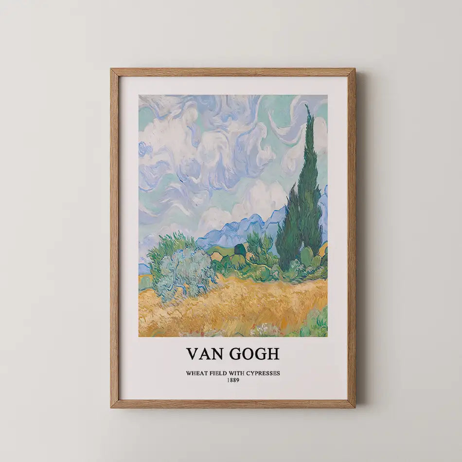 Painting of "Wheat Field with Cypresses" by Van Gogh, framed in natural wood, featuring vibrant skies and lush landscapes.