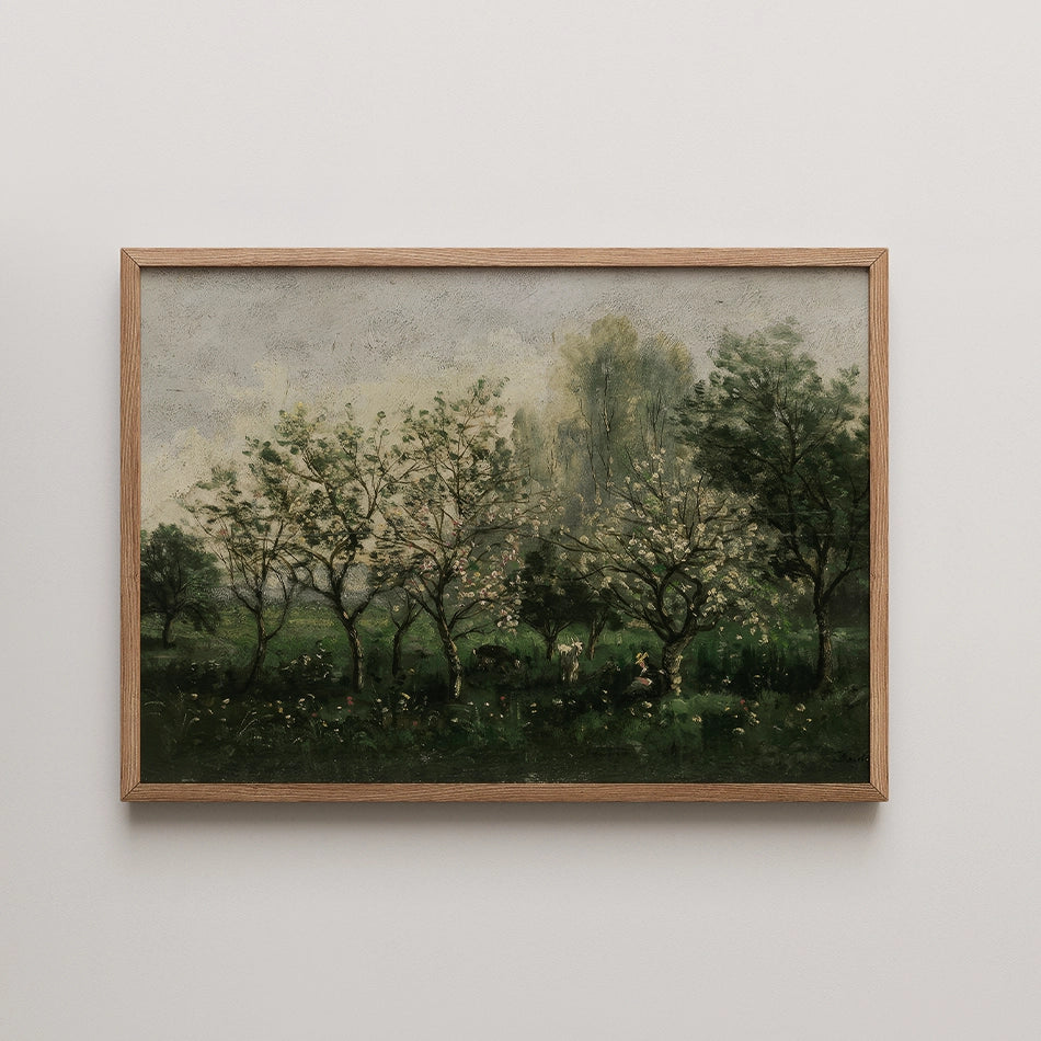 Framed painting of a serene landscape featuring blossoming trees under a cloudy sky.