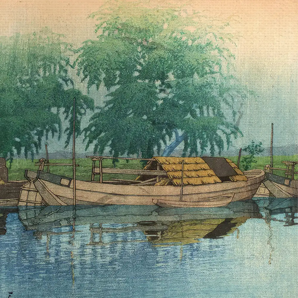 A tranquil painting of traditional wooden boats moored by the water's edge, surrounded by lush green trees and a serene landscape reflecting on the calm water surface.